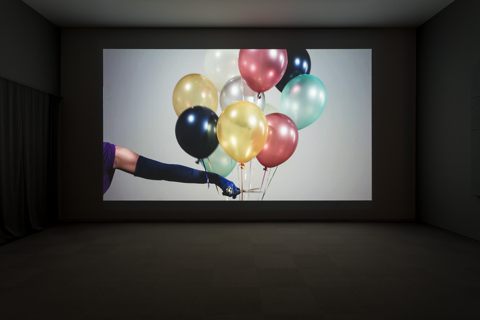 Oliver Husain, Purfled Promises, 2009, video with sound, 10:00 minutes. Installation view, Oliver Husain: Roving, Remai Modern, 2018. Photo: Blaine Campbell.