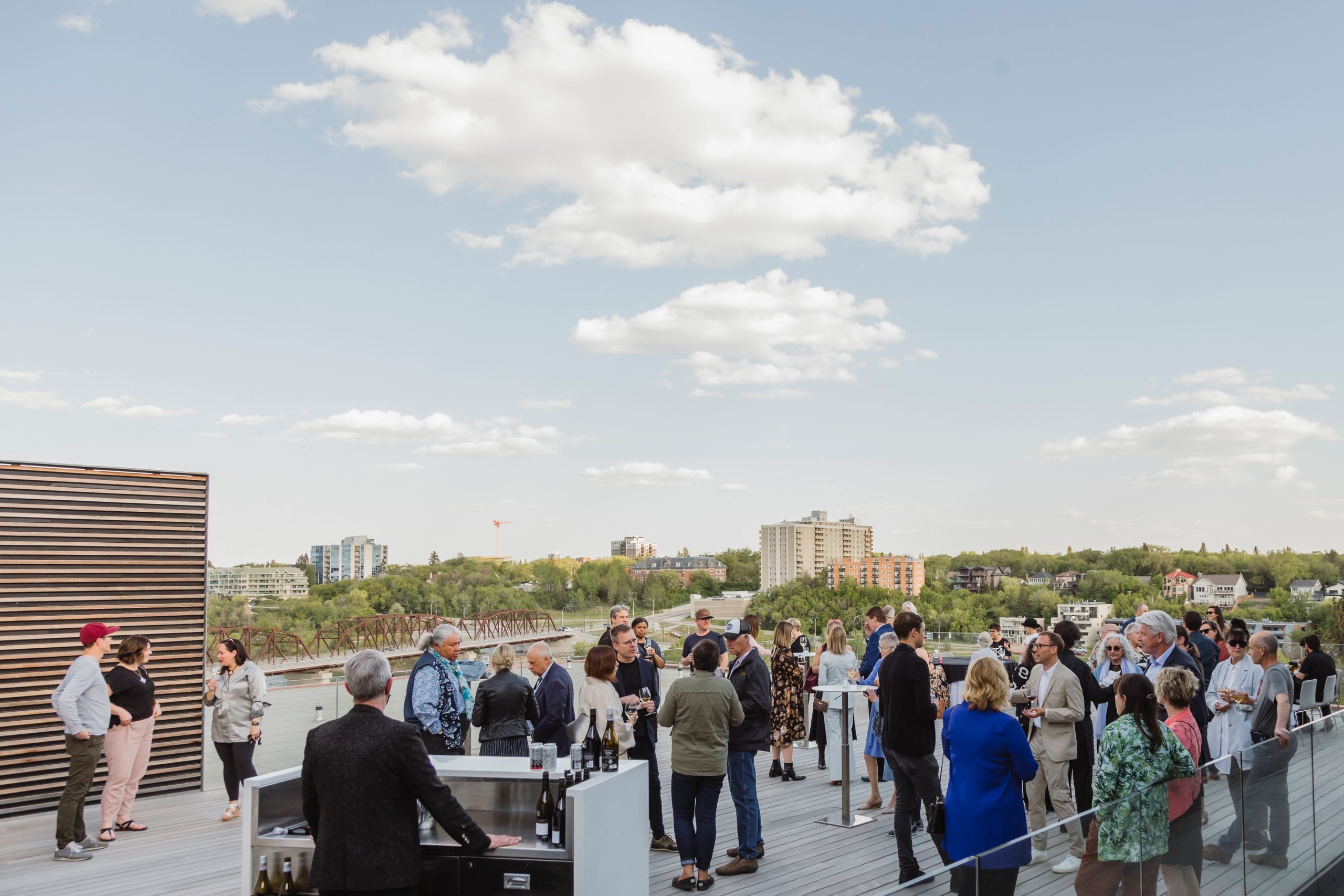 People socialize on Remai Modern's rooftop deck.